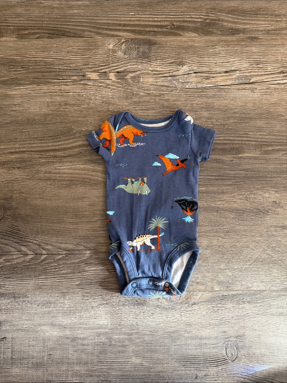 Carters Baby Short-Sleeve One-Piece in Navy with Dinosaur Print